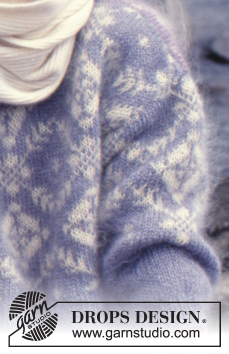 Polar Blues / DROPS 27-7 - Sweter na drutach, z włóczki DROPS Vienna lub Melody, z żakardem norweskim w płatki śniegu.