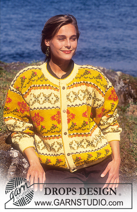 DROPS 28-13 - Rozpinany sweter na drutach, z żakardem, z włóczki DROPS Karisma. Od S do L.