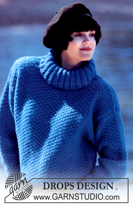 DROPS 7-15 - Sweter na drutach, podwójnym ryżem, z golfem, z włóczki DROPS Alaska.
