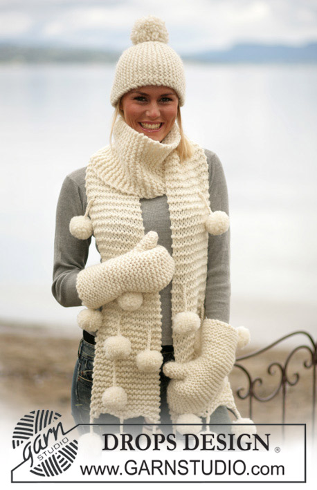 Pom Pom Adore / DROPS 98-6 - DROPS Hat, scarf and mittens in Snow or Andes.