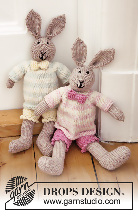 Mrs. Bunny / DROPS Baby 25-36 - Knitted bunny toy with pants, jumper and bow in DROPS BabyMerino