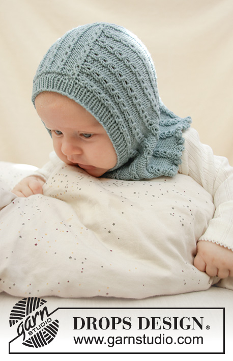 Warm Smiles / DROPS Baby 33-10 - Cagoule tricotée pour bébé en DROPS Baby Merino, avec point ajouré. De la taille préma au 2 ans
