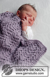 Lilac Warm / DROPS Baby 33-40 - Manta a punto para bebé con el patrón de calados en DROPS Big Merino. Tema: Manta para bebé