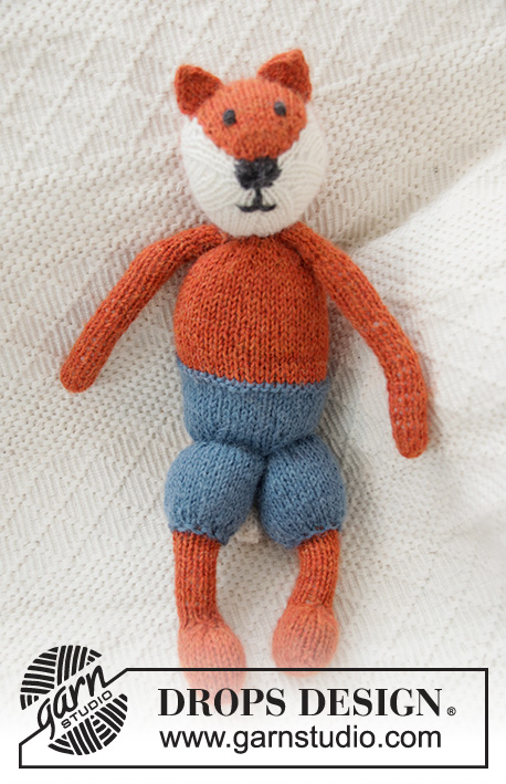 Mister Fox / DROPS Baby 36-11 - Knitted fox with trousers, jumper and bow-tie in DROPS Alpaca.