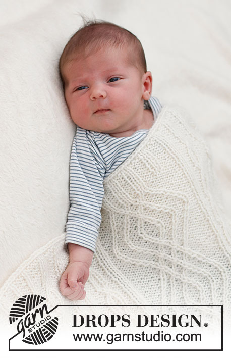Whisper of White / DROPS Baby & Children 39-2 - Knitted blanket for baby in DROPS Alpaca and DROPS Kid-Silk. The piece is worked with cables.