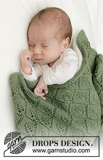 Endless Evergreen Blanket / DROPS Baby 46-13 - Knitted baby blanket in DROPS BabyMerino. The piece is worked back and forth with lace pattern.