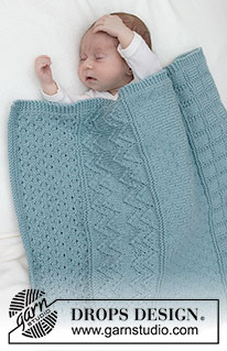 Dot Dot Line Blanket / DROPS Baby 46-3 - Couverture tricotée pour bébé en DROPS Merino Extra Fine. Se tricote en allers et retours avec point relief.