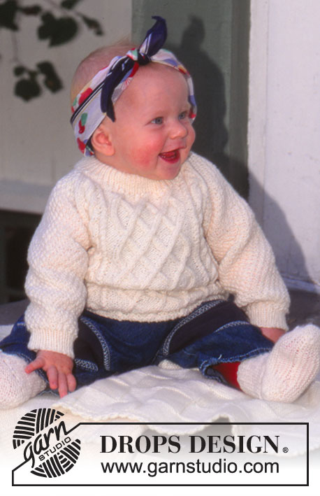 Little Pernille / DROPS Baby 6-2 - DROPS Bluse med snoninger og raglan samt tæppe i Karisma. Sokker i Babyuld. 
