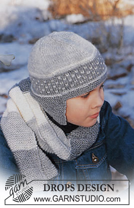 DROPS Children 12-11 - Strikket sæt med hue og halstørklæde til børn i DROPS Karisma. Arbejdet strikkes med striber, nordisk mønster og retstrik. Størrelse 3 - 14 år.