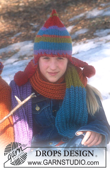 DROPS Children 12-42 - Strikket sæt med hue og halstørklæde til børn i DROPS Snow. Arbejdet strikkes i striber med retstrik og helpatent. Størrelse 3 - 14 år.