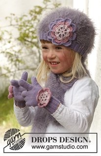 Michelle gloves / DROPS Children 23-13 - Guantes de punto con flor en ganchillo en DROPS BabyMerino y DROPS Glitter. Talla niños 3 a 12 años.