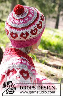 Warmhearted Hat / DROPS Children 27-4 - Bonnet tricoté avec jacquard et pompon, en DROPS Merino Extra Fine. Pour enfant, du 1 au 6 ans