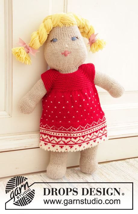 Christmas Cora / DROPS Children 35-15 - Knitted dress for doll in DROPS BabyMerino. Piece is knitted top down with raglan, Nordic pattern and garter stitch.