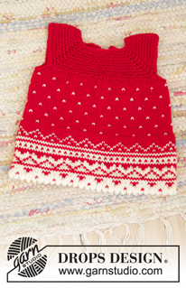 Christmas Cora / DROPS Children 35-15 - Robe pour poupée tricotée de haut en bas en DROPS BabyMerino, avec emmanchures raglan, jacquard nordique et point mousse.