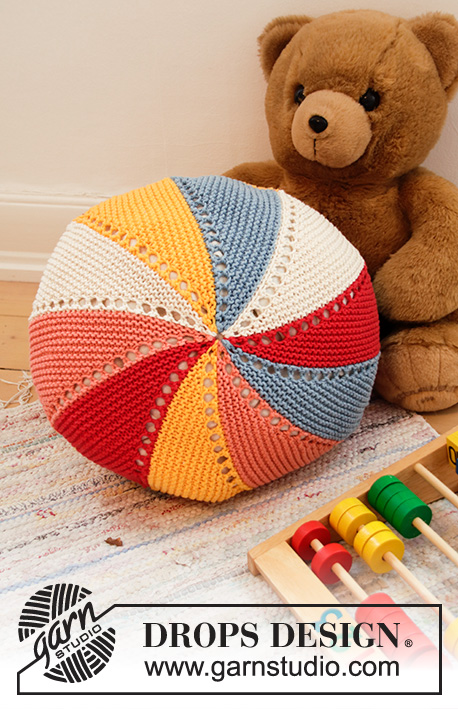 Colour Wheel Pillow / DROPS Children 35-4 - Knitted pillow case in DROPS Paris. Piece is knitted in stripes, garter stitch and short rows.