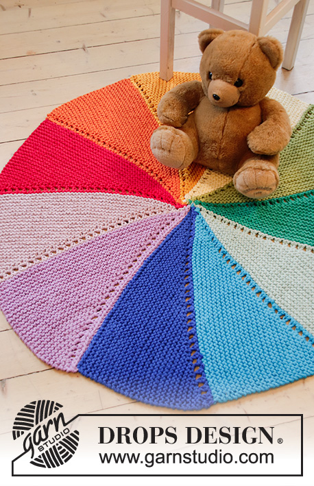 Colour Wheel Carpet / DROPS Children 35-5 - Knitted carpet in 3 strands DROPS Paris. Piece is knitted with stripes, garter stitch and short rows.