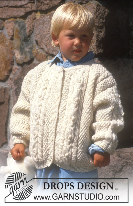 DROPS Children 4-4 - Cardigan in Karisma Classic with cables.