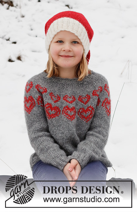 Merry Hearts / DROPS Children 41-3 - Dětský vánoční svetr / pulovr s kruhovým sedlem a norským vzorem se srdíčky pletený shora dolů a špičatá čepice pletená v kruhových řadách zdola nahoru z příze z příze DROPS Air. Velikost 2 – 14 let. Motiv: Vánoce.