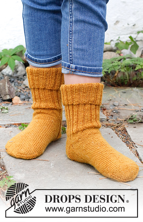 Sunnyside Down / DROPS Children 41-31 - Knitted socks for children in DROPS Fabel. Sizes 26-43 = US 9 1/2-12 1/2.