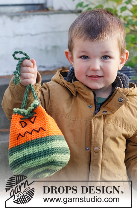 Scary Pumpkin Bag / DROPS Children 44-11 - Crocheted pumpkin sweet-bag/bag in DROPS Paris. The piece is worked in the round with stripes and embroidered face. Theme: Halloween.