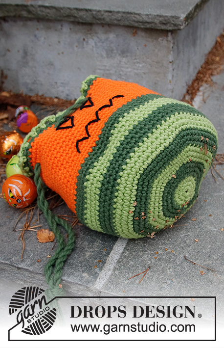 Scary Pumpkin Bag / DROPS Children 44-11 - Crocheted pumpkin sweet-bag/bag in DROPS Paris. The piece is worked in the round with stripes and embroidered face. Theme: Halloween.