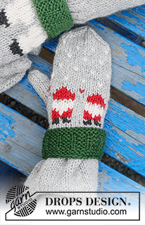 Santa Time Mittens / DROPS Children 44-16 - Knitted mittens for children in DROPS Karisma. The piece is worked bottom up with coloured Santa pattern. Sizes 2 – 14 years. Theme: Christmas.