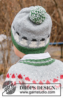 Snowman Time Hat / DROPS Children 44-18 - Dětská čepice s bambulí - kulich s norským vzorem se sněhuláky pletený zdola nahoru z příze DROPS Karisma. Velikost 2 – 14 let. Motiv: Vánoce.