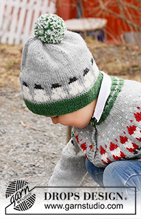 Snowman Time Hat / DROPS Children 44-18 - Stickad mössa till barn i DROPS Karisma. Arbetet stickas nedifrån och upp i flerfärgat mönster med snögubbe. Storlek 2 – 14 år. Tema: Jul.