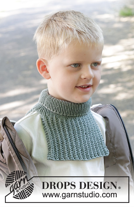 Trailhead Neck Warmer / DROPS Children 47-23 - Plastron tricoté pour enfant en DROPS Merino Extra Fine. Se tricote de haut en bas avec point fantaisie relief. Du 2 au 12 ans.