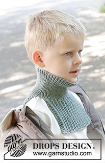 Trailhead Neck Warmer / DROPS Children 47-23 - Gola com peitilho tricotada para criança em DROPS Merino Extra Fine. Tricota-se de cima para baixo com ponto fantasia em relevo. Tamanhos: 2 - 12 anos.