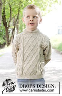 Ocean Ropes / DROPS Children 47-32 - Pull tricoté de bas en haut pour enfant, en DROPS Merino Extra Fine. Se tricote avec point fantaisie relief et torsades. Du 2 au 12 ans.