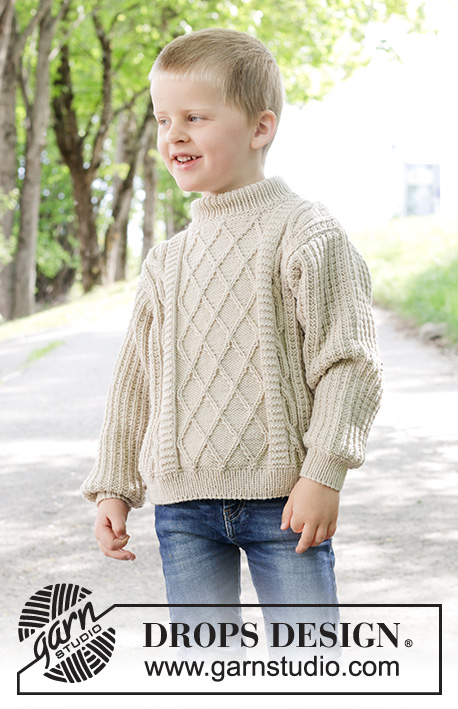 Ocean Ropes / DROPS Children 47-32 - Dětský pulovr s plastickým vzorem a copánky pletený zdola nahoru z příze DROPS Merino Extra Fine. Velikost 2 až 12 let.
